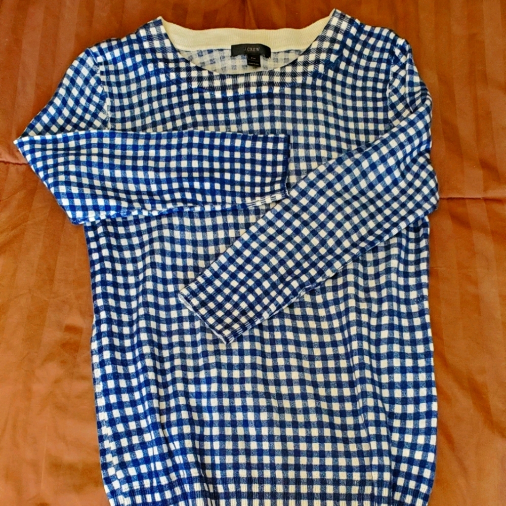 Blue and white plaid sweater